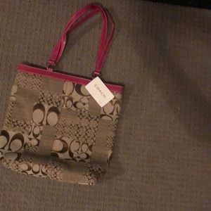 Beige and brown canvass Coach Tote with dark pink straps beige inside